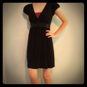 Simple, but pretty black dress.