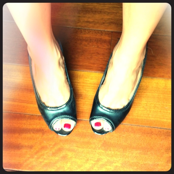 Black peep pumps
