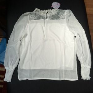 Pretty white shirt with lace in front and back