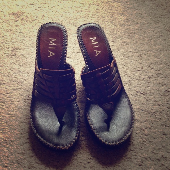 Brown thong sandals from The Buckle