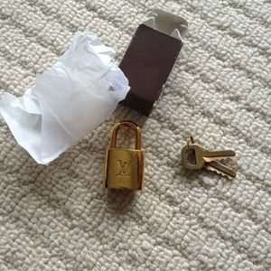Sold- Authentic LV lock and key
