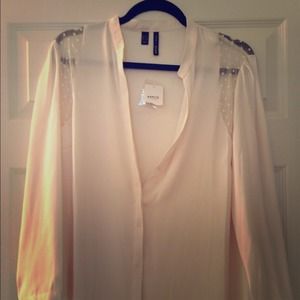 Gorgeous blouse, cream color, with black belt