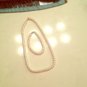 Pearl necklace and bracelet.