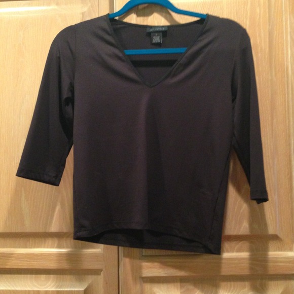 The limited large black stretchy v neck top.