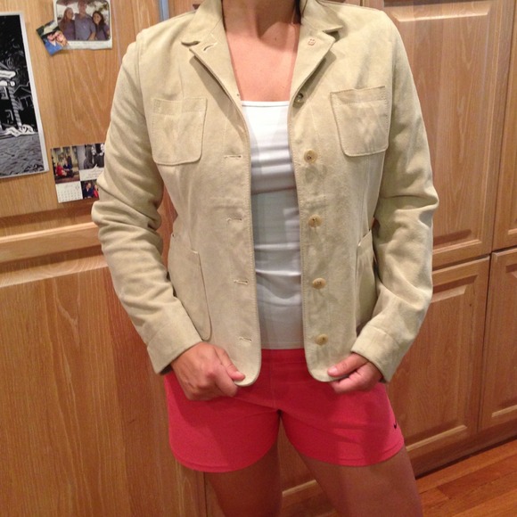 Suede button up tan jacket.