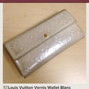 LV wallet, box included- reduced for the party!
