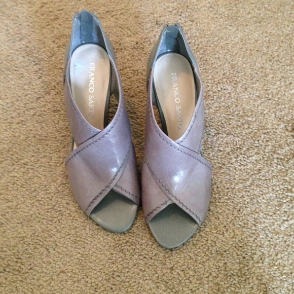 Never worn grey wedge. Size 8.