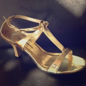 Gold sandal heel.