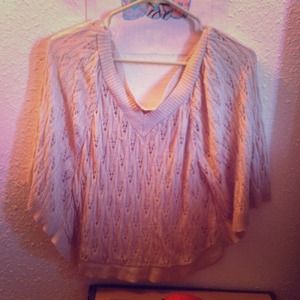 tan knit poncho. new without tags.