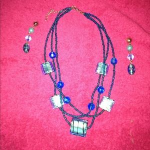 Handmade glass necklace and earring set.