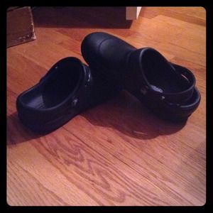 Black work style crocs.