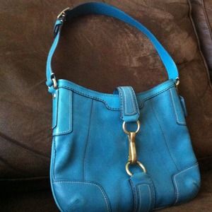 Authentic turquoise and chocolate coach bag