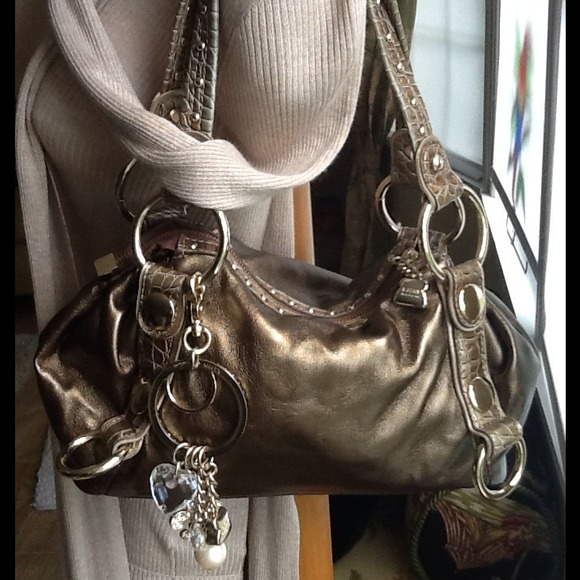 Sold bundled.  Reserved Kathy VanZeeland purse