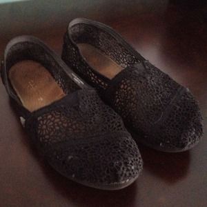 Worn crochet TOMS in black