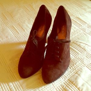 Brown Swede lace up boot heals.