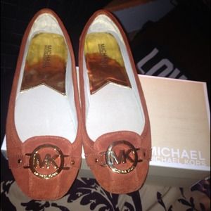 Authentic MK burnt orange flats. Only worn once!