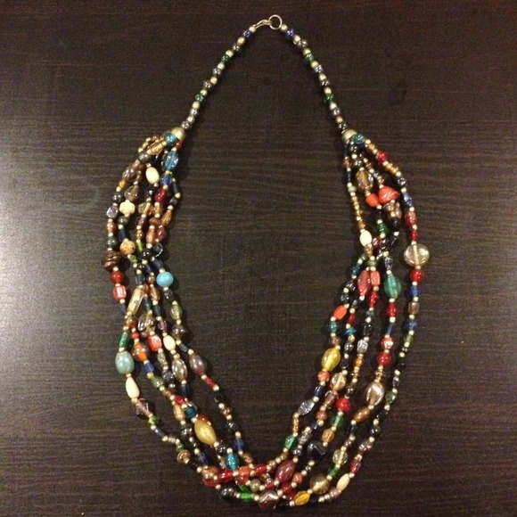 Glass beaded 5 strand multicolored necklace.