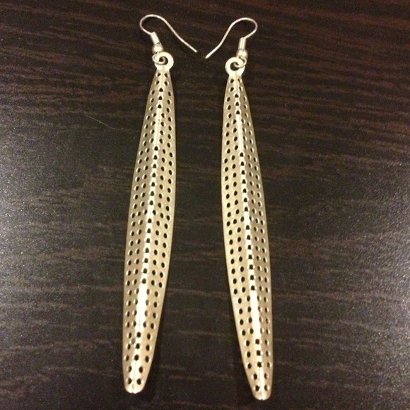 Silver colored long dangly earrings