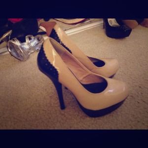 Tan and black pumps