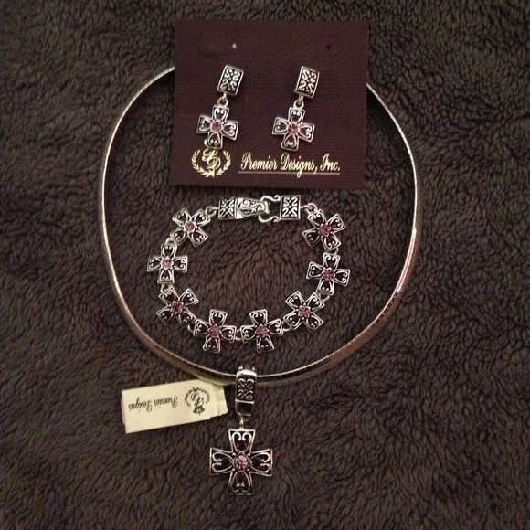 Necklace, slide, bracelet, and earrings