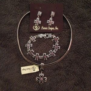 Necklace, slide, bracelet, and earrings