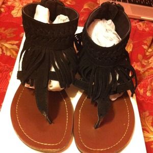 Black fringe Minnetonka sandals