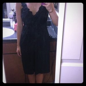 Black dress with ruffled neckline