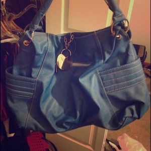 Blue purse with heart charm