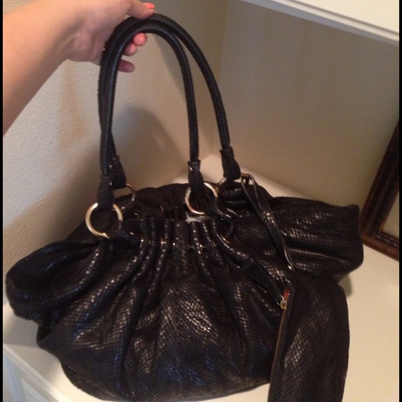 🚨REDUCED PRICE🚨UNIQUE LEATHER BAG W/ SMALL POUCH