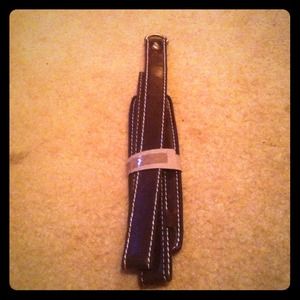 Brown coach leather strap.