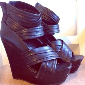 Sexy black strappy wedges.