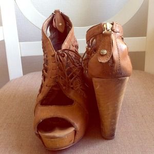 Funky open toe beige wedges.