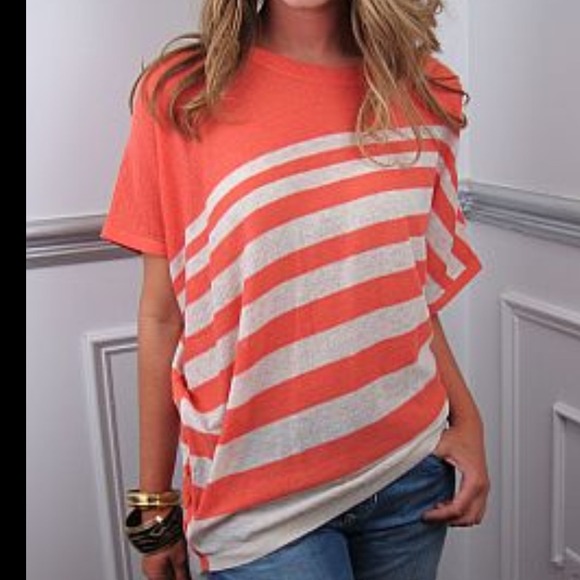 Sold!!!! Assymetrical hem knit top. Size small.