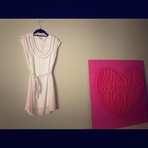 White chiffon cocktail dress. Belt optional.