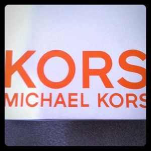 Brand new Michael Kors leather brown boots