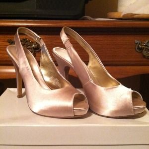 Lulu Townsend sling back pumps.