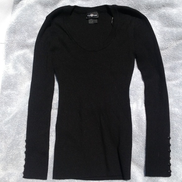 Black sweater with button accents
