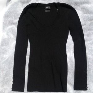 Black sweater with button accents