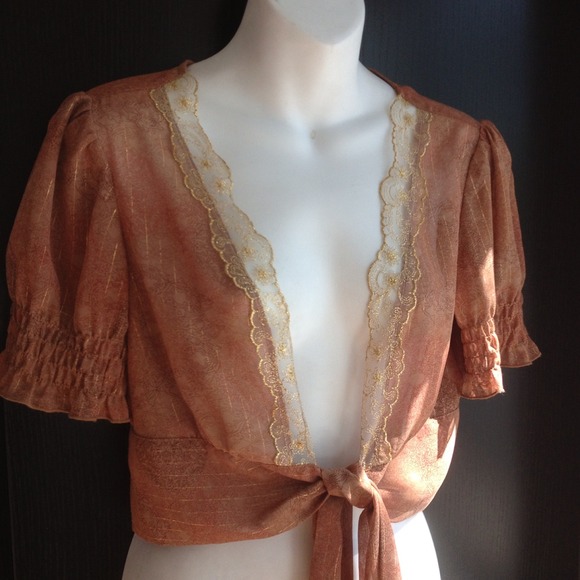 XX SOLD XX Bolero with gold details.