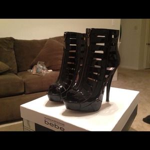 Zippered black patent caged heels