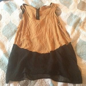 Tan shirt with sheer black panel