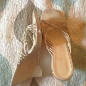 Lightly worn tan strapped wedges