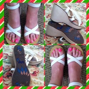 White strappy sandals by Indigo Clark