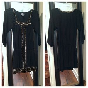 Black mini dress with gold accents