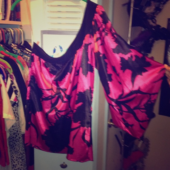 Flirty and fun one shoulder top!