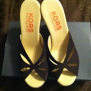 Michael Kors on HOLD for Jetsetta