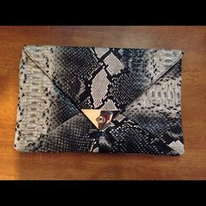Snake print envelope clutch