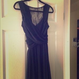 Navy dress, lace back. Hits just above knee