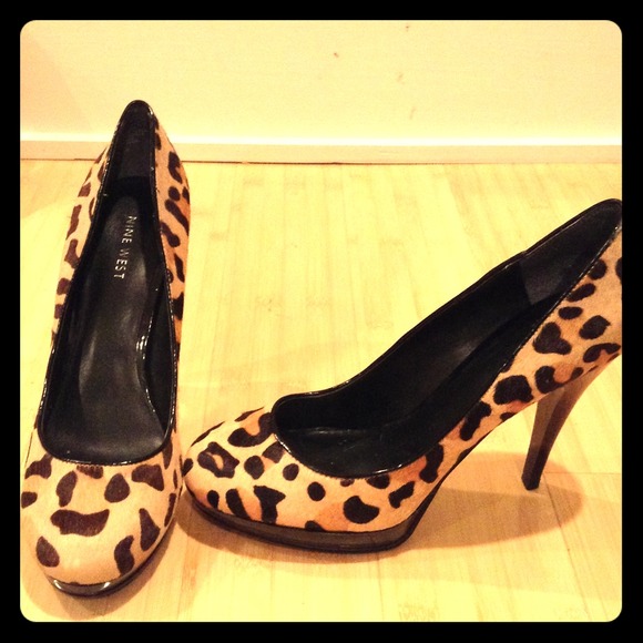 Nine West Leopard platform pumps