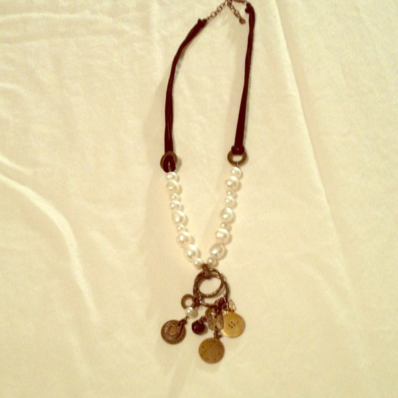 Silpada black leather, pearl and charm necklace.